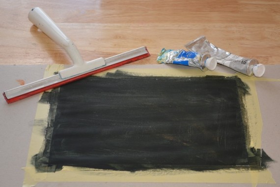 Fensterwischer, Farbtuben, schwarz grundiertes Papier