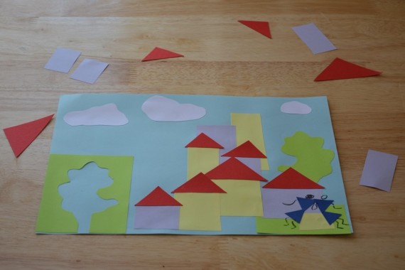 Formen auf Papier kleben und eine Stadt draus basteln